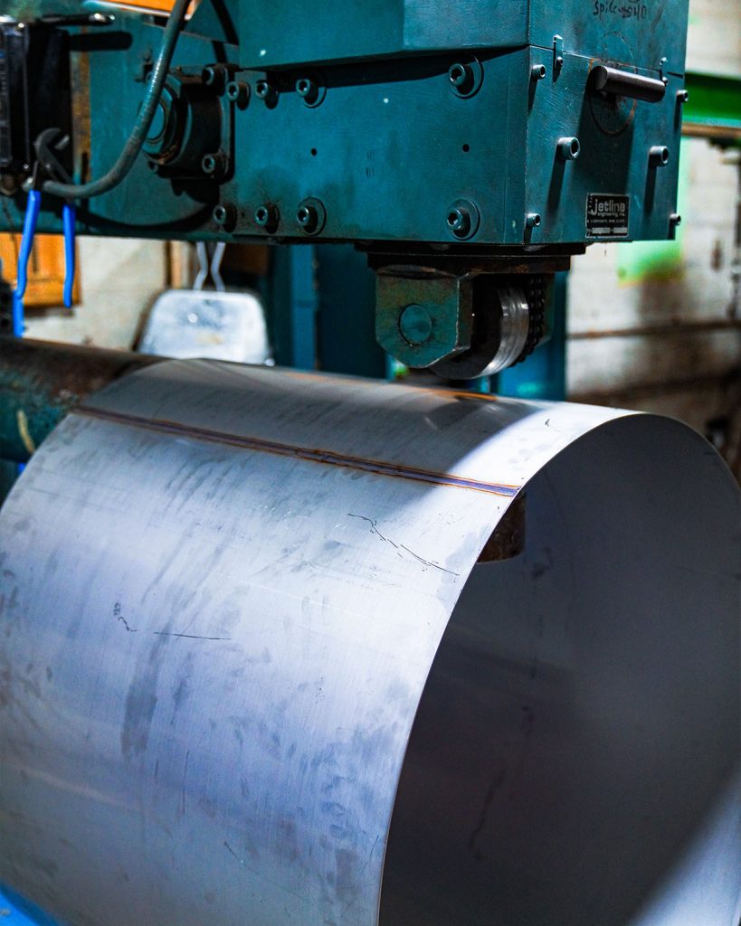 Stainless steel cylinder being rolled and welded