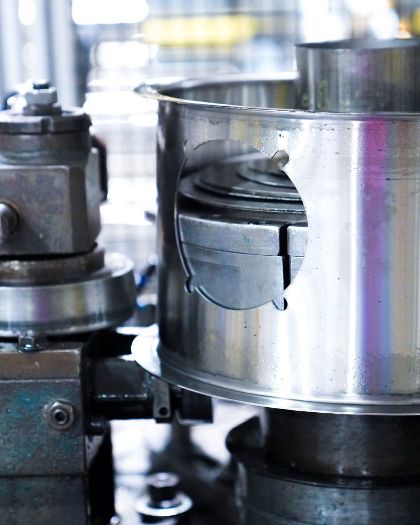 Stainless Steel Cylinder with cutouts and flange